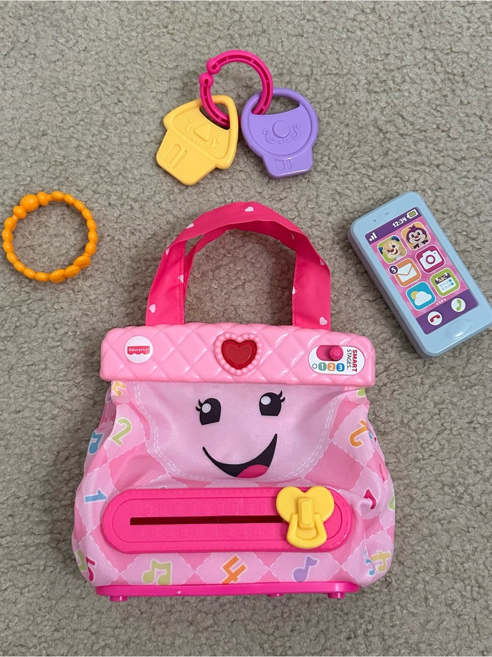 Fisher-Price Pink Musical Purse Playset with Yellow and Purple Keys